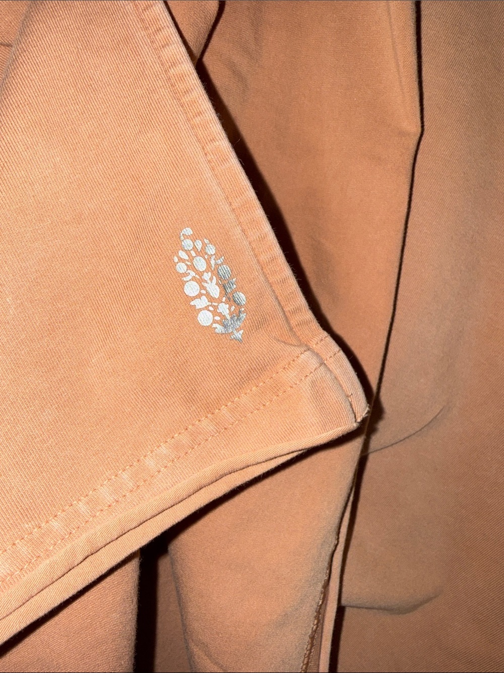 FP Movement by Free People Oversized V-Neck Short Sleeve Top in Dusty Peach - Picture 6 of 6